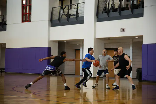 UNI Faculty Build Connections on the Basketball Court